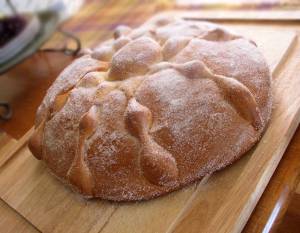 Pan de muertos is traditionally served with coffee or hot chocolate. 